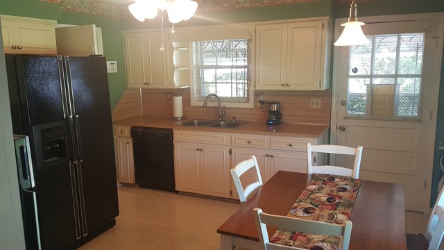 2848 Reese Road Columbus, GA 31907 - Photo 5 of 26 a kitchen with stainless steel appliances granite countertop a refrigerator and a stove top oven