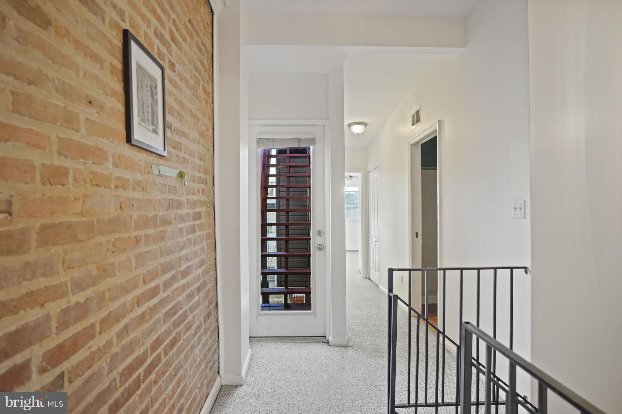 1417 Covington Street Baltimore, MD 21230 - Photo 14 of 25 a view of a hallway