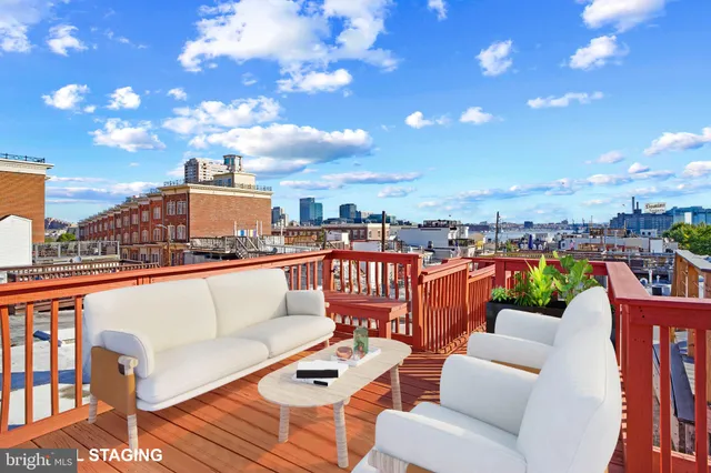 a view of a terrace with couches