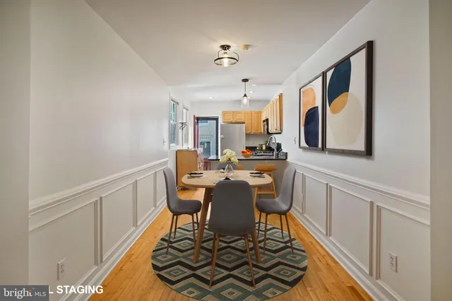 a view of a dining room with furniture