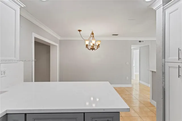 a view of kitchen and hallway