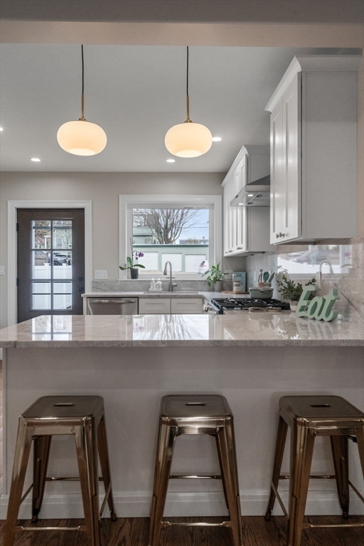 79 Read Street Winthrop, MA 02152 - Photo 14 of 33 a kitchen with chairs and a table