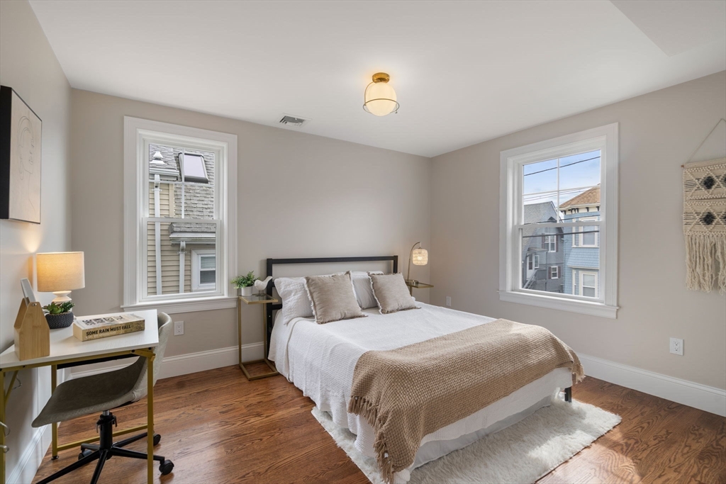 79 Read Street Winthrop, MA 02152 - Photo 22 of 33 a bedroom with a bed and a window