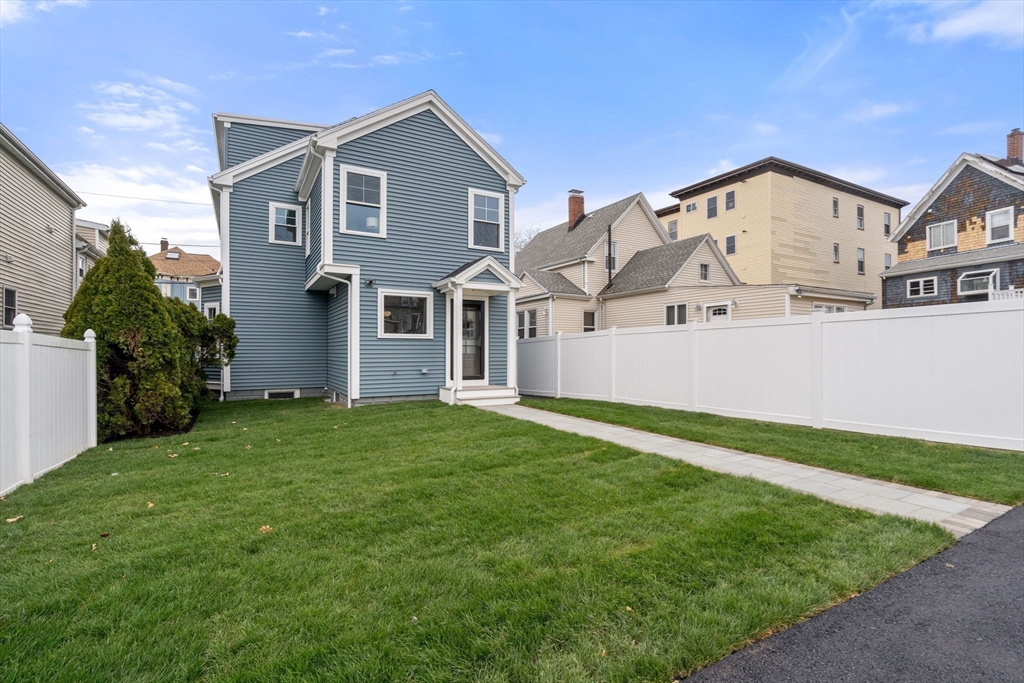 79 Read Street Winthrop, MA 02152 - Photo 33 of 33 a view of a big house with a big yard and large trees