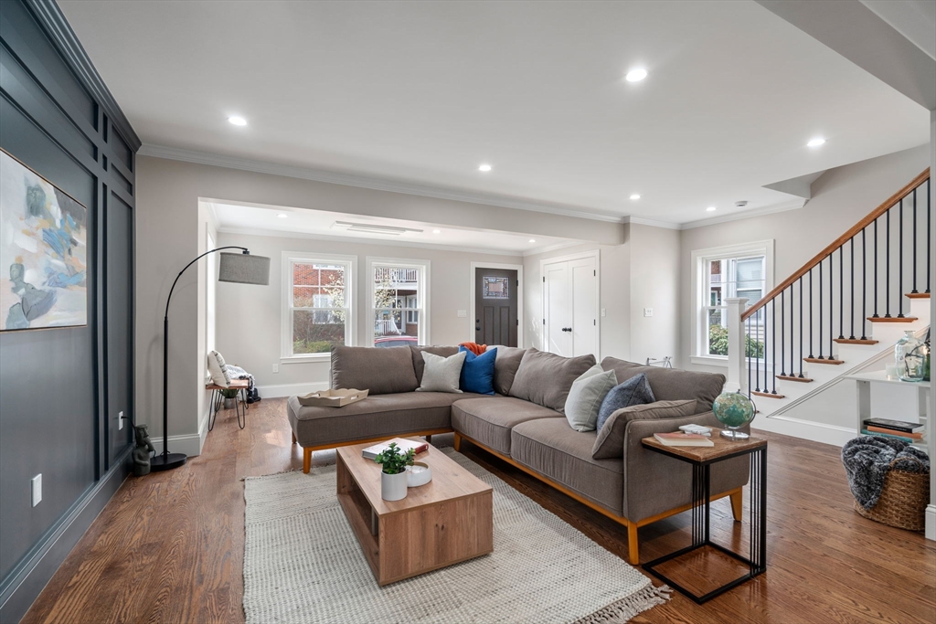 79 Read Street Winthrop, MA 02152 - Photo 5 of 33 a living room with furniture and a wooden floor