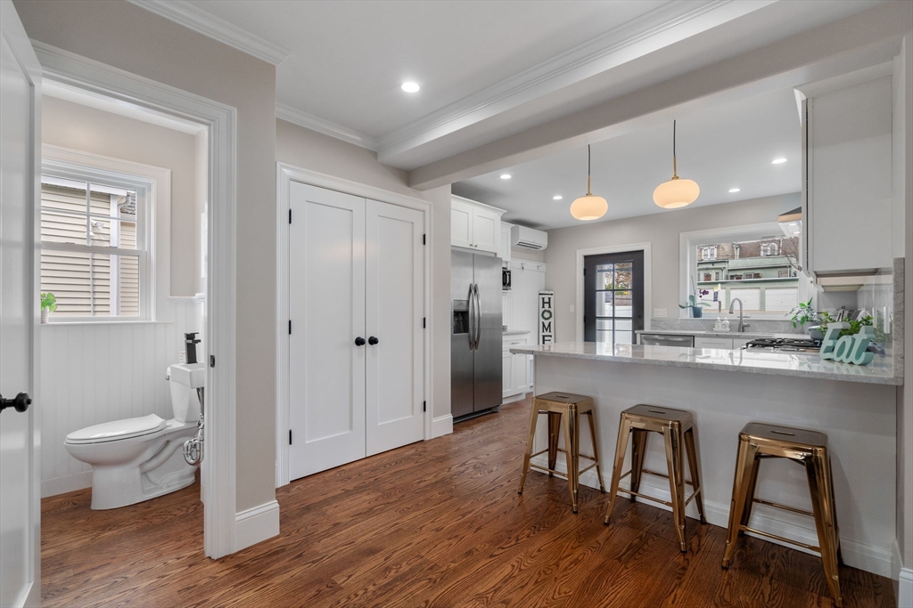 79 Read Street Winthrop, MA 02152 - Photo 7 of 33 a kitchen with a table and chairs