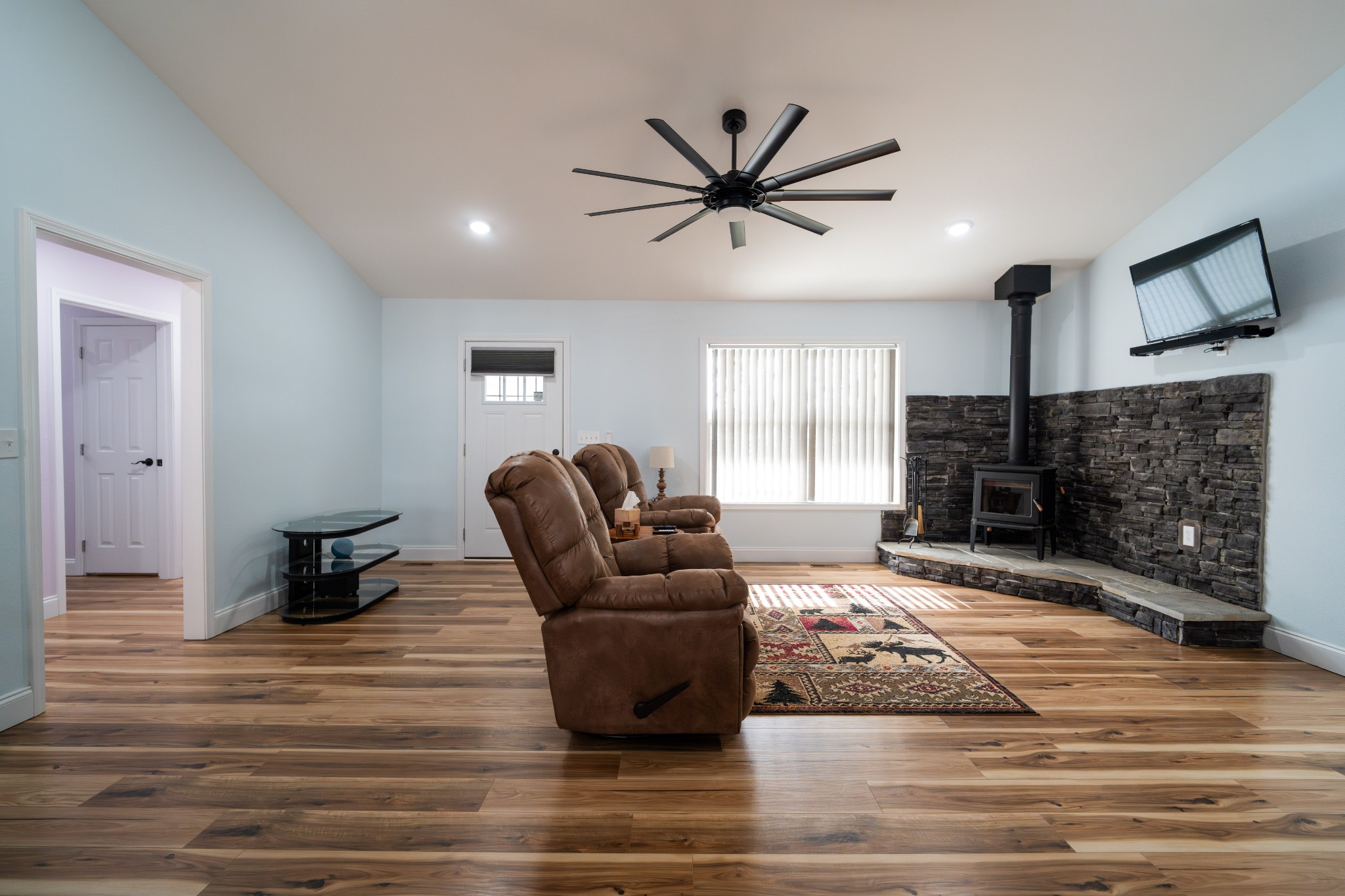 1561 Bicknell Road Clarkrange, TN 38553 - Photo 12 of 44 a living room with furniture and a fireplace