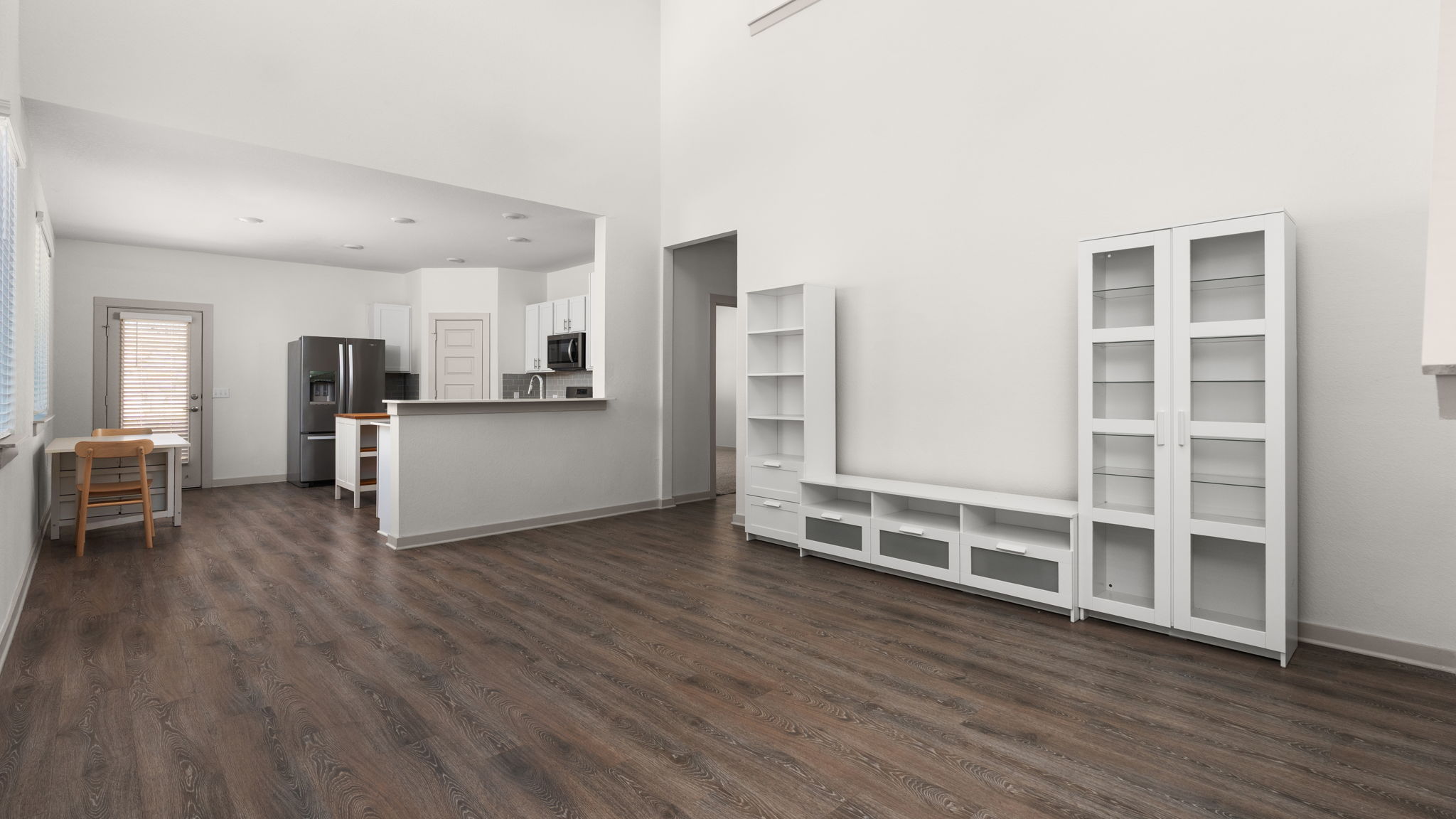 101 Merrick Road Georgetown, TX 78628 - Photo 15 of 38 Owner can also provide living room media organizational space, dining table, and kitchen island