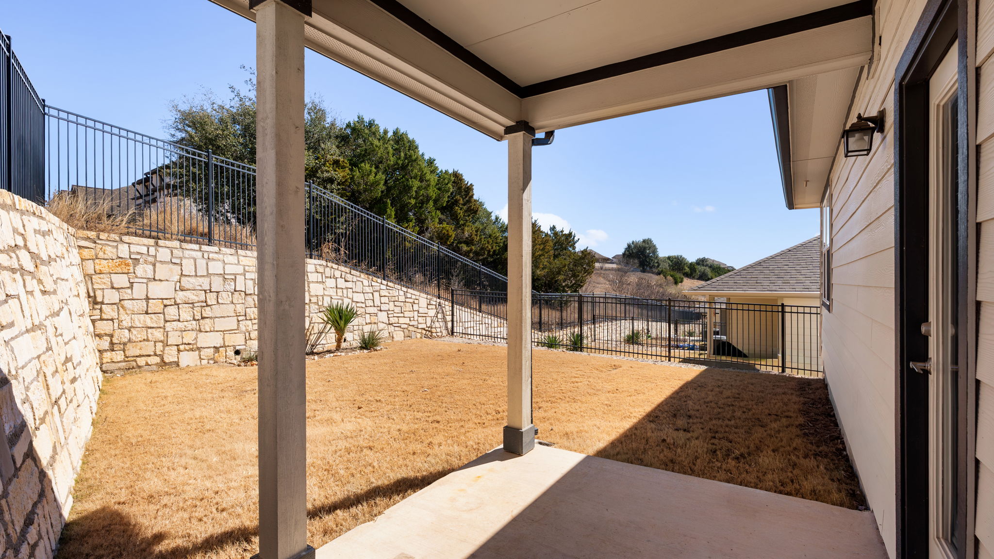 101 Merrick Road Georgetown, TX 78628 - Photo 16 of 38 Fenced backyard featuring a patio