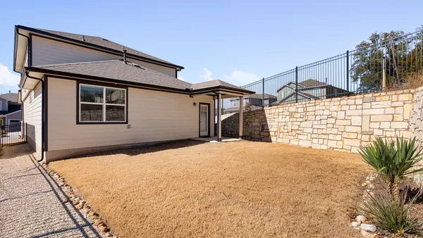 a house view with a outdoor space