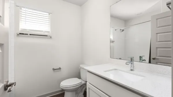a bathroom with a sink and a toilet