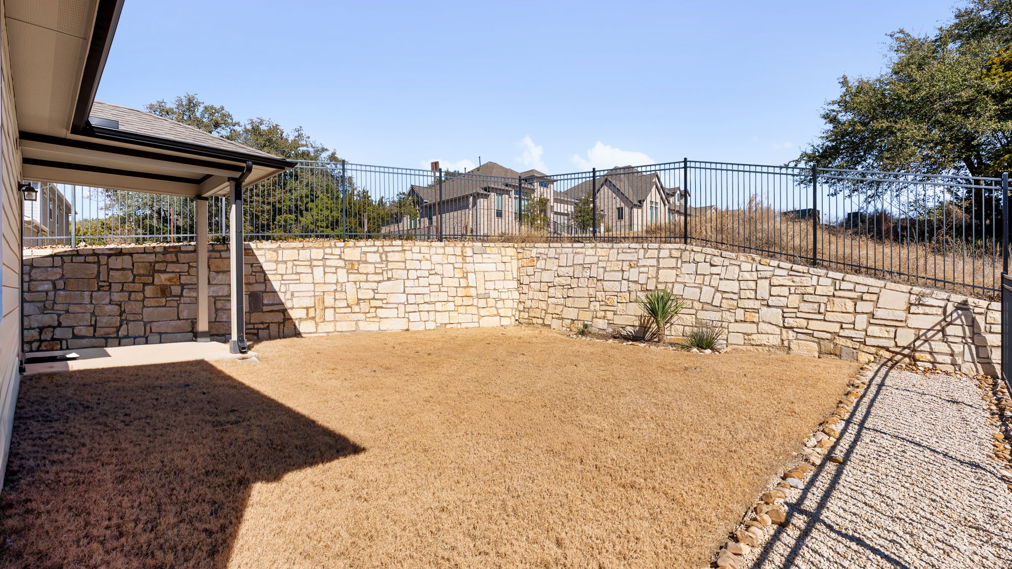 101 Merrick Road Georgetown, TX 78628 - Photo 37 of 38 Fenced backyard featuring a patio