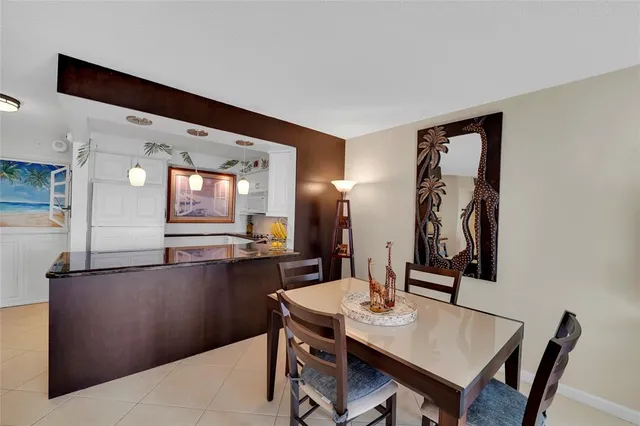 a view of a kitchen area with furniture and window