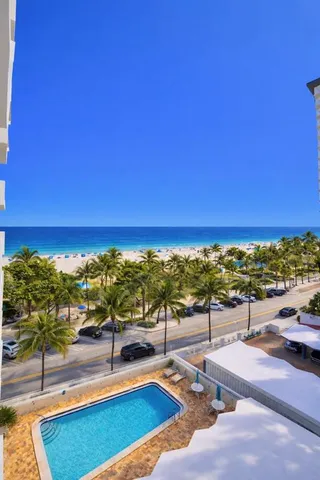 a view of a city with an ocean