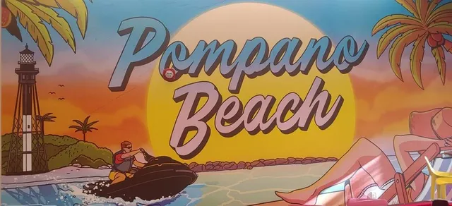 a backyard of a house with lawn chairs and a dining table