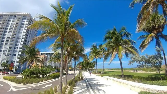 a view of building with yard