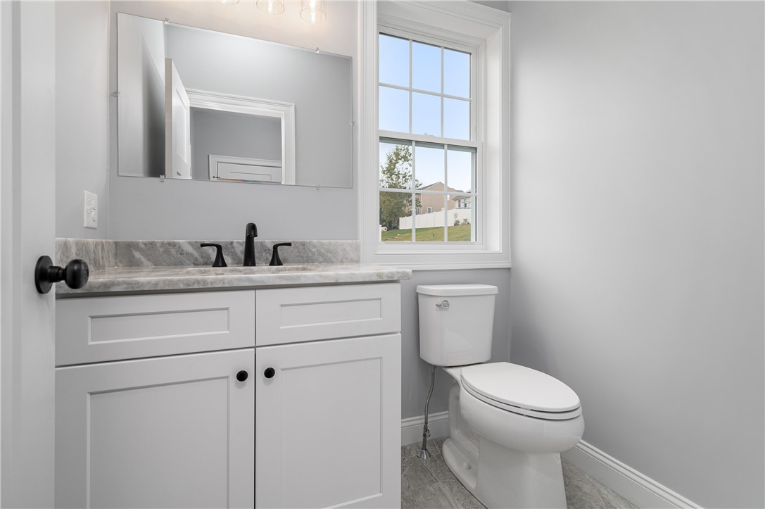 426 Louise Street Woonsocket, RI 02895 - Photo 11 of 33 Half Bath on First Floor
Marble Vanity, Tile Floors