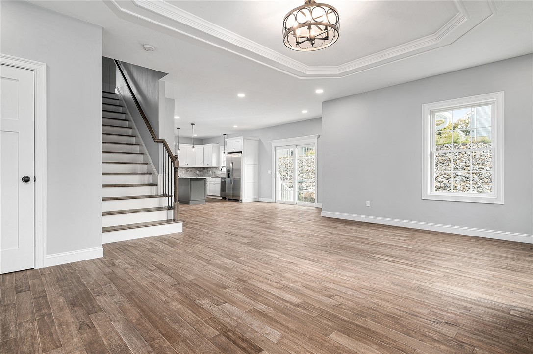 426 Louise Street Woonsocket, RI 02895 - Photo 13 of 33 Shot of Living Room with Staircase