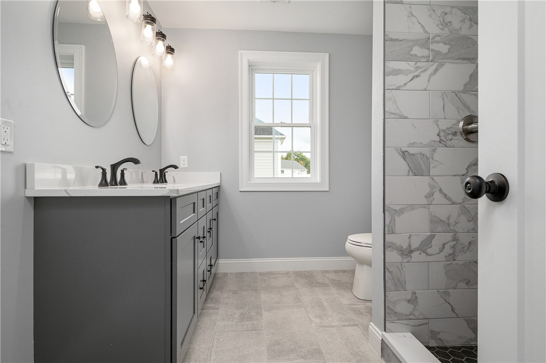 426 Louise Street Woonsocket, RI 02895 - Photo 16 of 33 Double Vanity w/Quartz Counter, Tile Floor