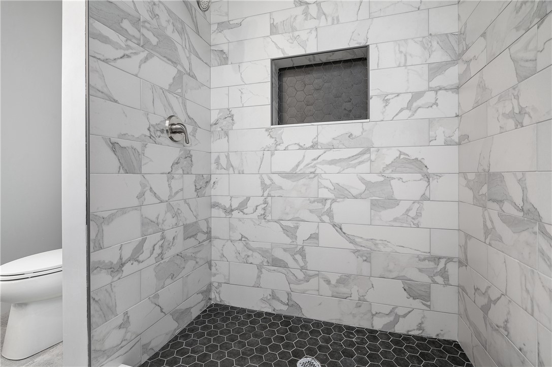 426 Louise Street Woonsocket, RI 02895 - Photo 17 of 33 Gorgeous Tiled walk-in Shower w/Shelf