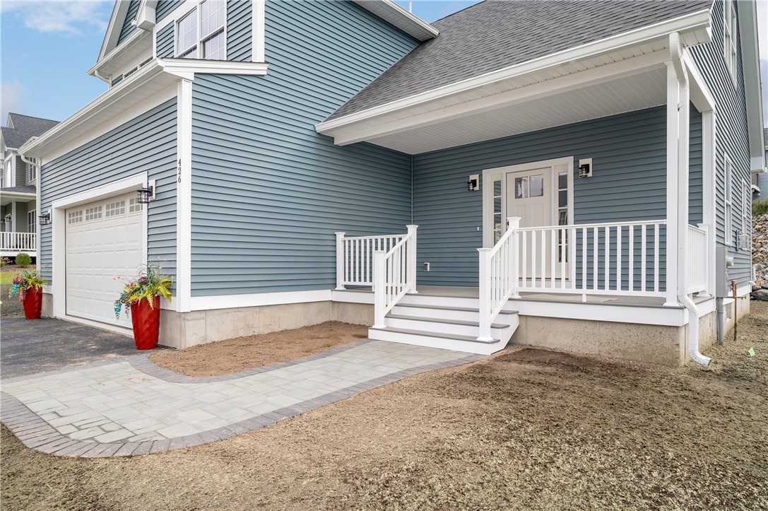426 Louise Street Woonsocket, RI 02895 - Photo 3 of 33 Pavers Patio and Inviting Front Porch