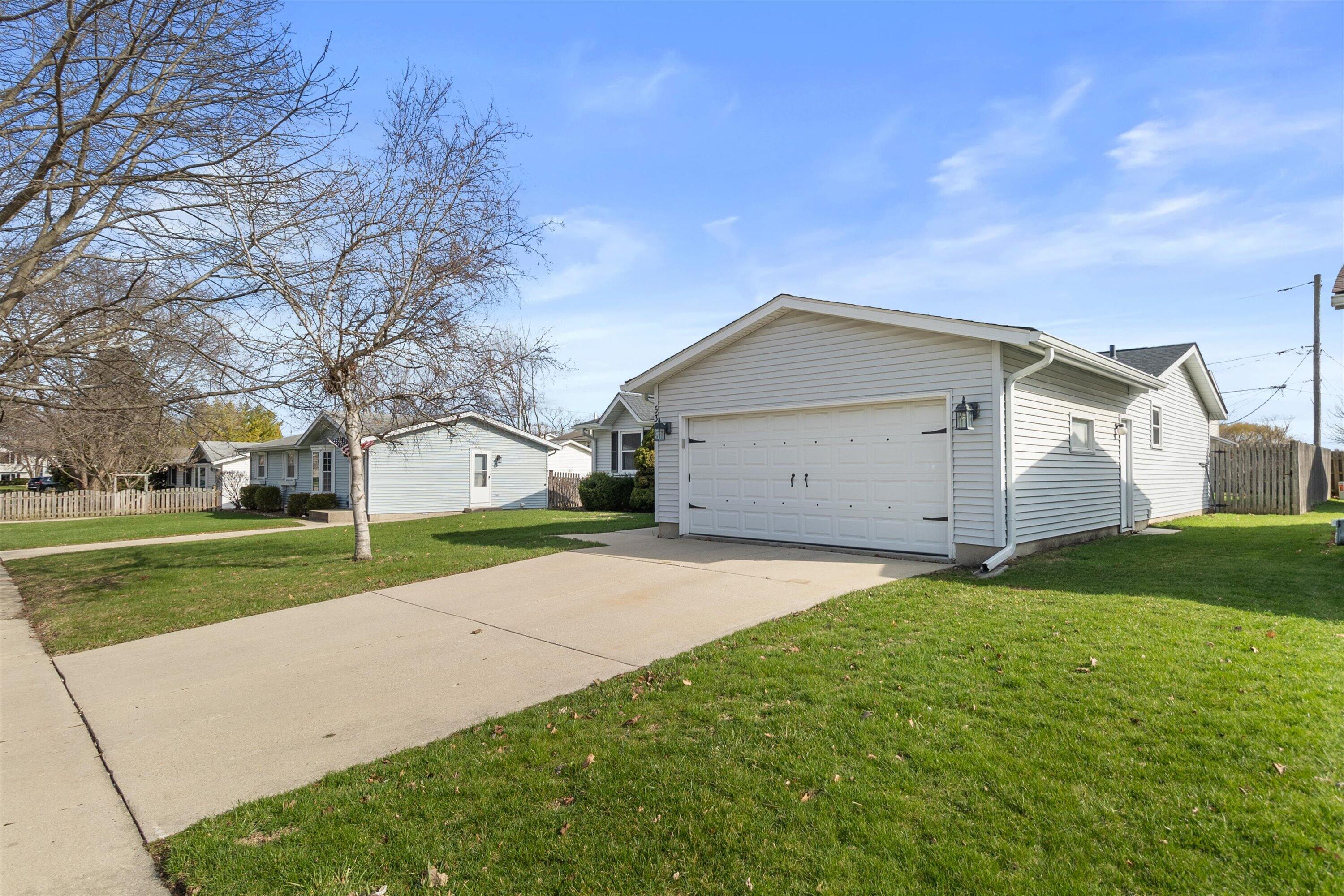 5315 66th Place Kenosha, WI 53142 - Photo 24 of 48 Garage and driveway