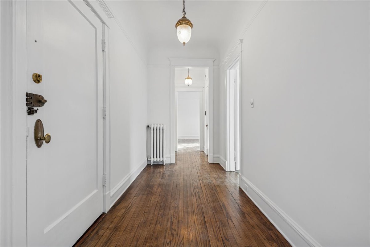 1201 Michigan Avenue, Unit 2 Evanston, IL 60202 - Photo 2 of 20 a view of a hallway with wooden floor