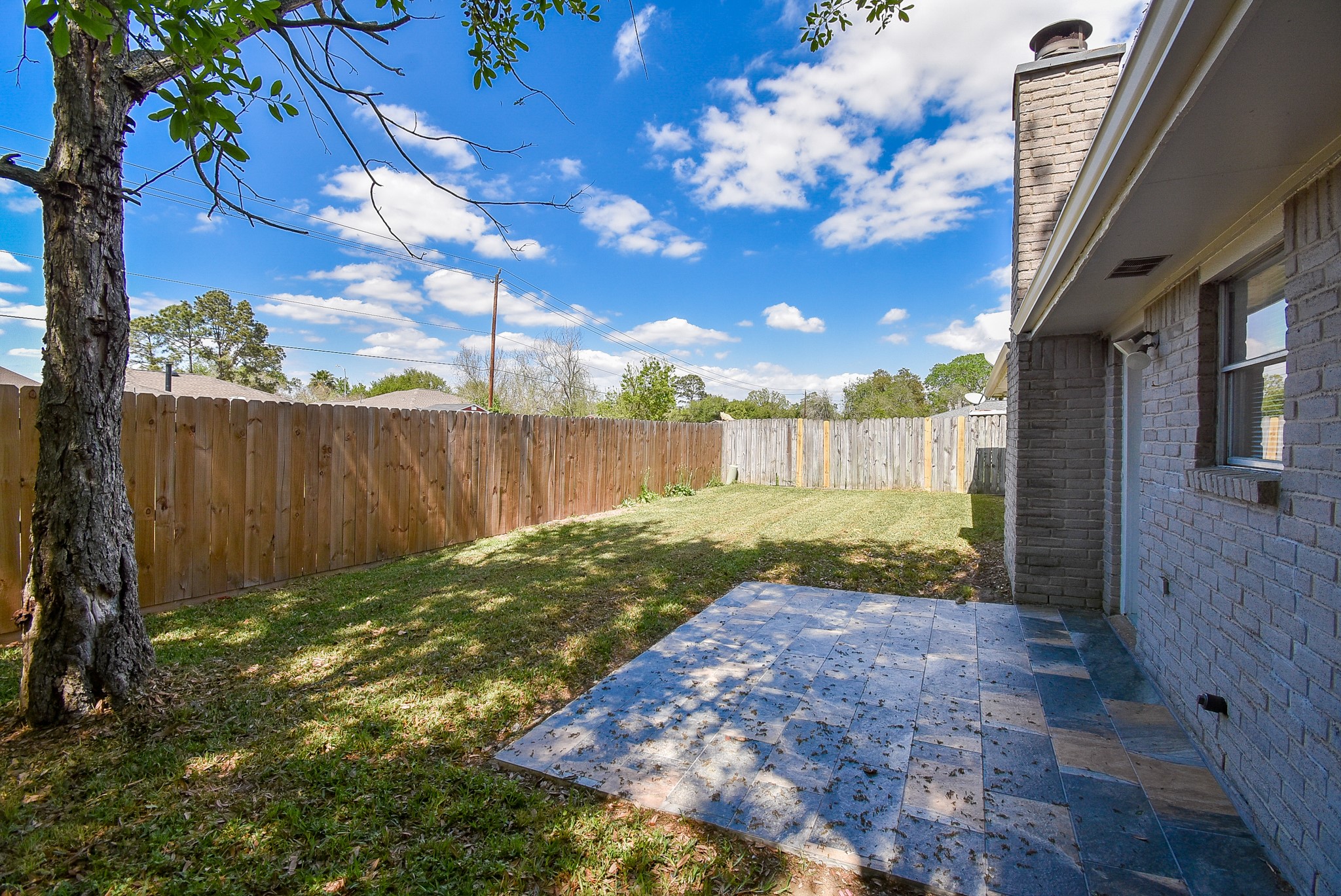 9527 Kingsvalley Drive Houston, TX 77075 - Photo 43 of 45 a view of a backyard with pathway
