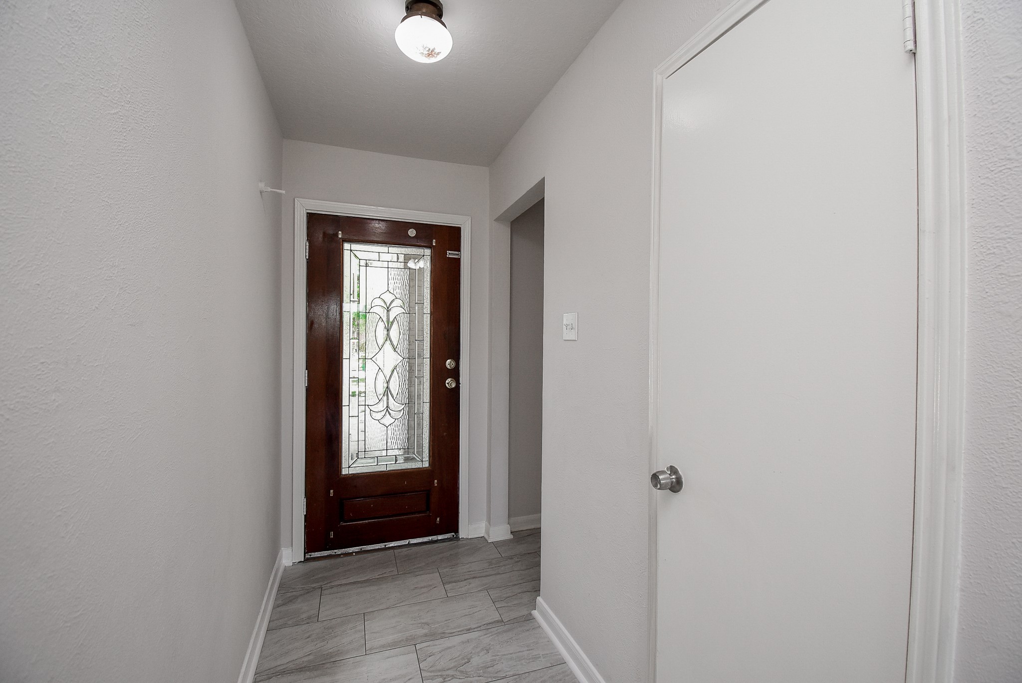 9527 Kingsvalley Drive Houston, TX 77075 - Photo 6 of 45 a view of an entryway door