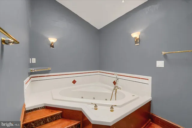 a bathroom with a sink and shower