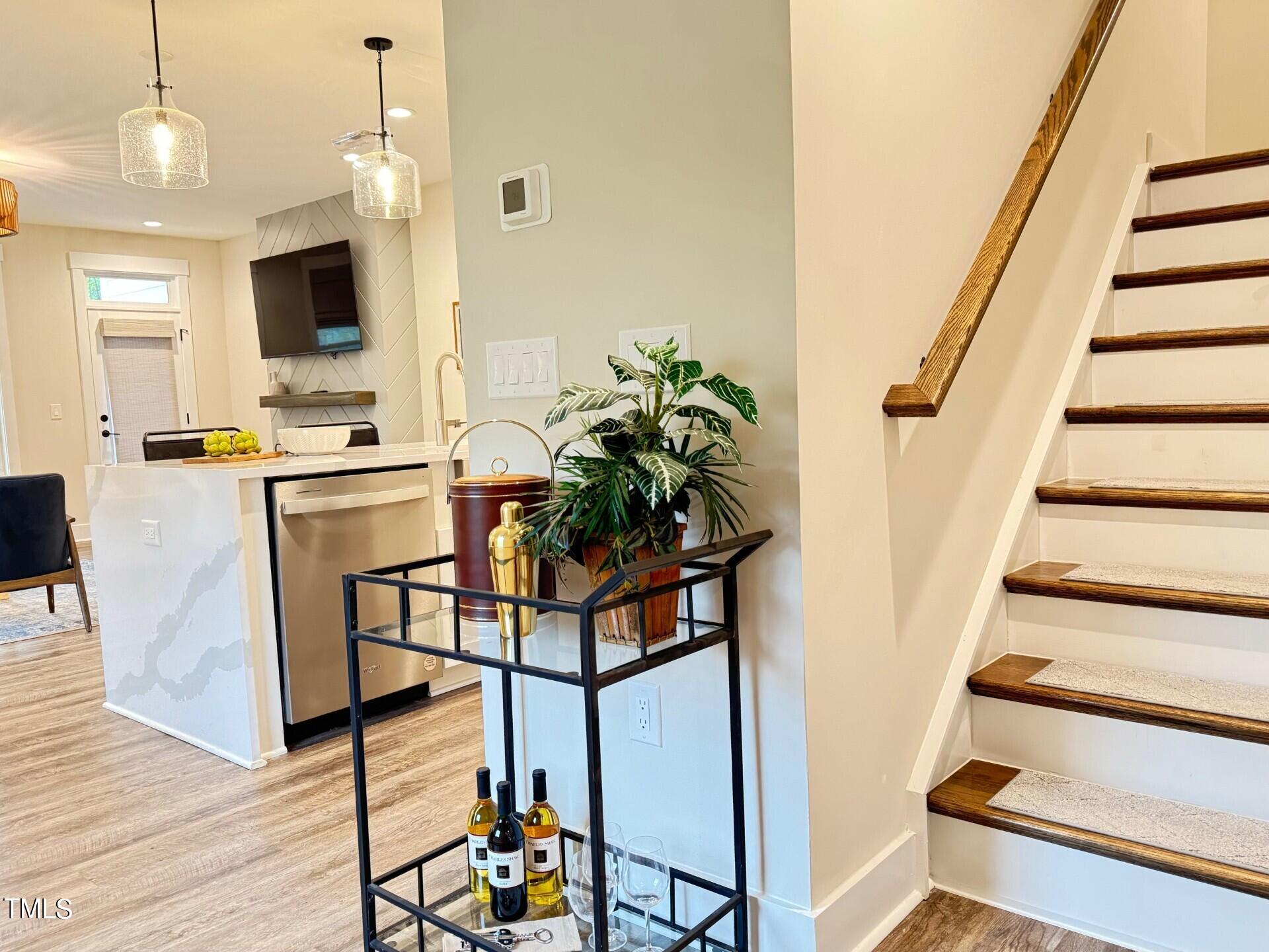 4013 Emerald Green Road Raleigh, NC 27612 - Photo 5 of 36 a view of kitchen with furniture and wooden floor