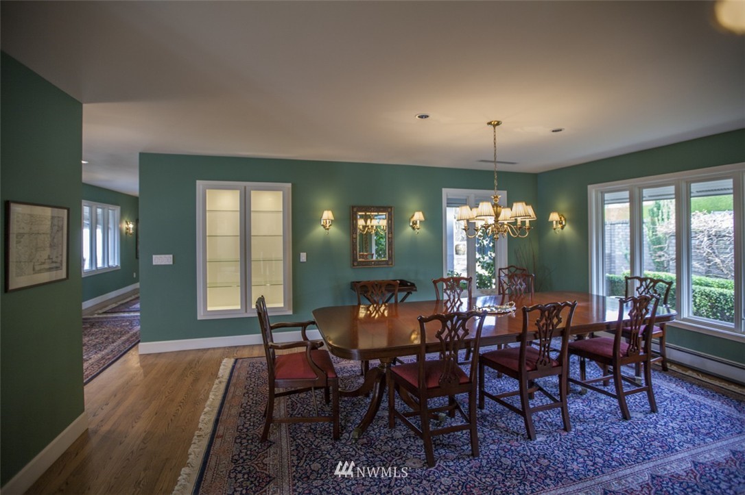 346 Bayside Road Bellingham, WA 98225 - Photo 2 of 25 a view of a dining room with furniture window and wooden floor