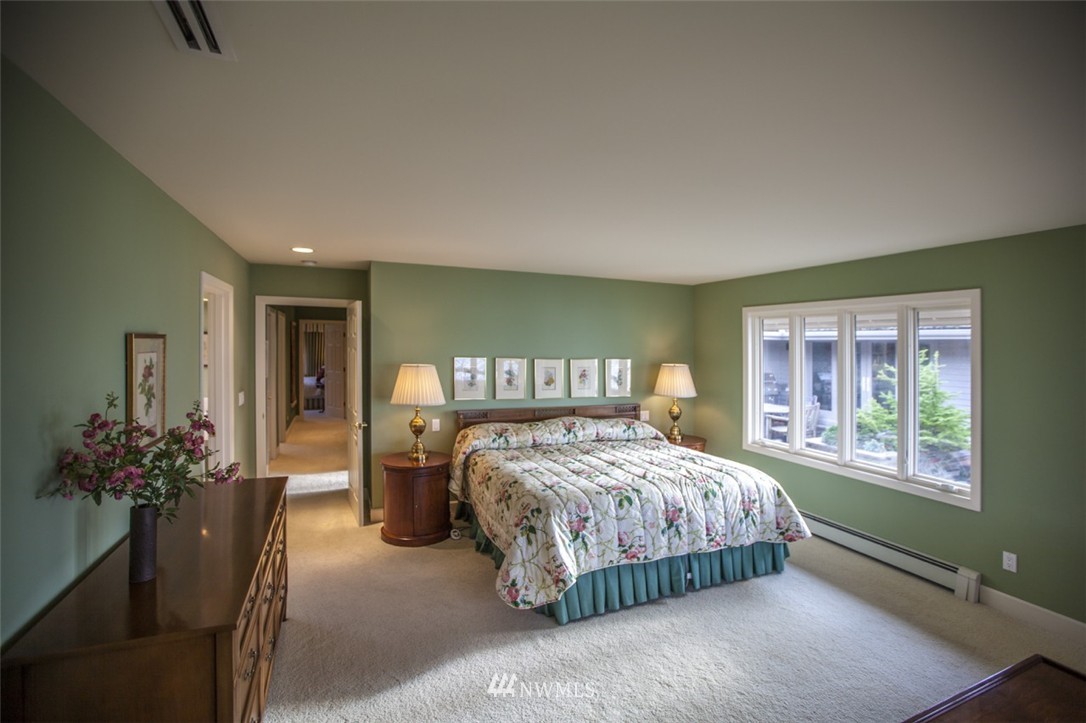 346 Bayside Road Bellingham, WA 98225 - Photo 13 of 25 a bedroom with a bed and window