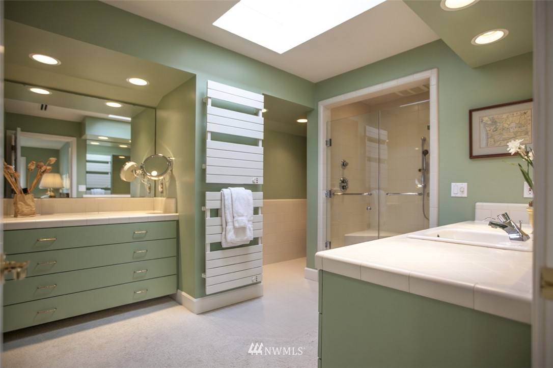 346 Bayside Road Bellingham, WA 98225 - Photo 16 of 25 a bathroom with a sink double vanity and a mirror