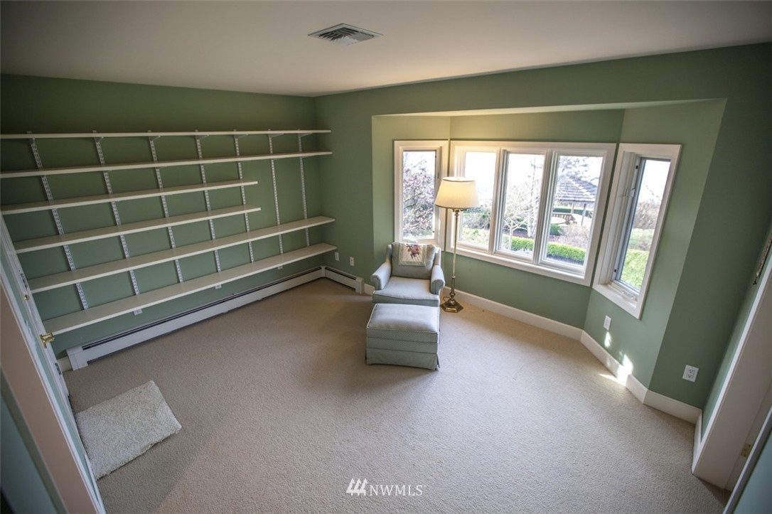 346 Bayside Road Bellingham, WA 98225 - Photo 19 of 25 a room with gym equipment and a large window