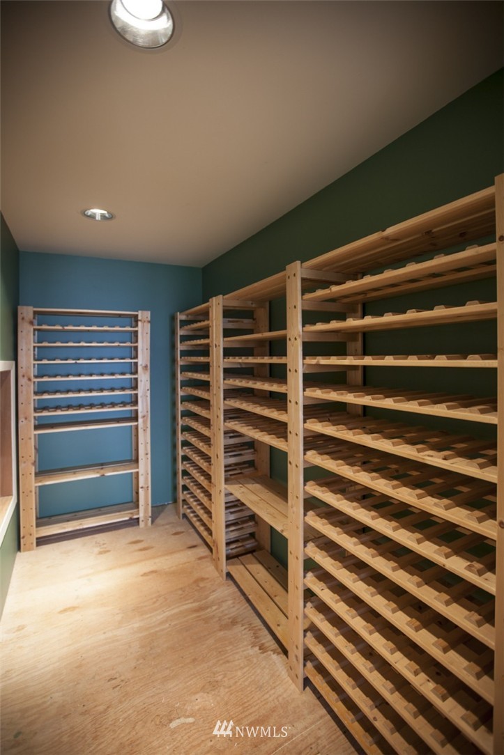 346 Bayside Road Bellingham, WA 98225 - Photo 20 of 25 a view of room with a staircase and a ceiling fan