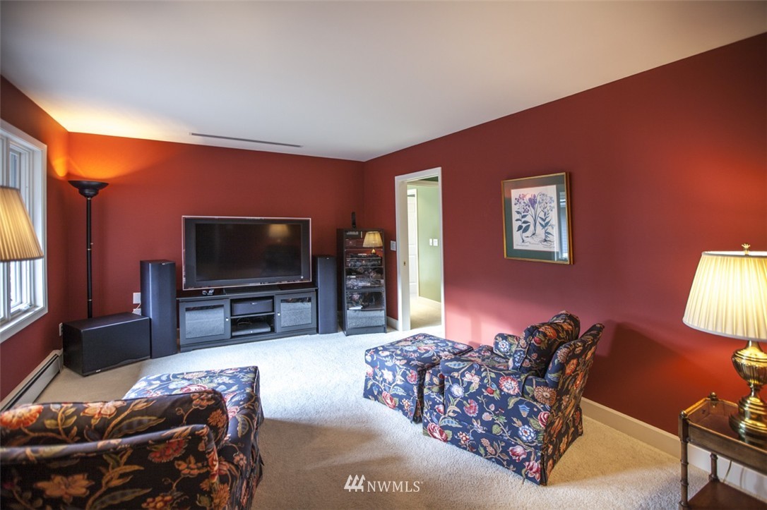 346 Bayside Road Bellingham, WA 98225 - Photo 9 of 25 a living room with furniture and a flat screen tv