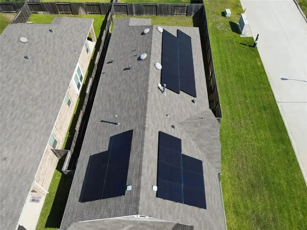 a spacious bathroom with a double vanity sink and a mirror