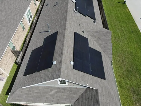 a aerial view of a house with a garden