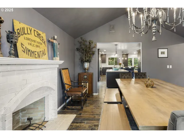 a bathroom with a sink a mirror and a shower