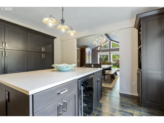 a kitchen with a wooden cabinets and a stove