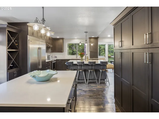 a kitchen with a sink and a stove