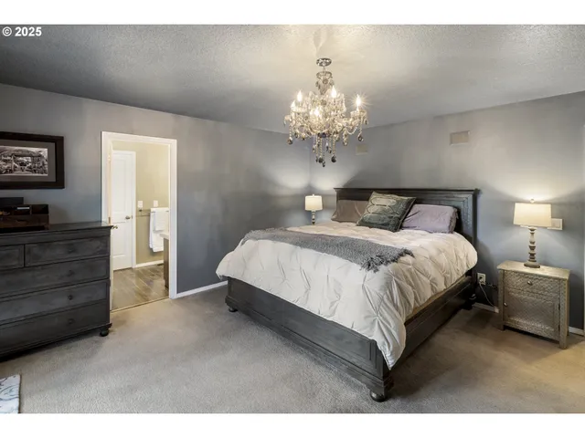 a bathroom with a sink a mirror and a shower