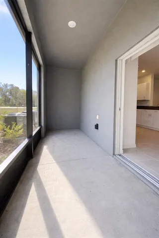 a view of a lake with houses in the back