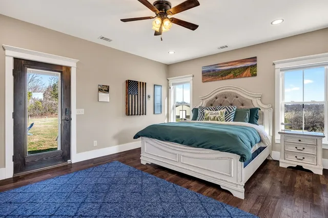 a view of entryway with stairs and wooden floor