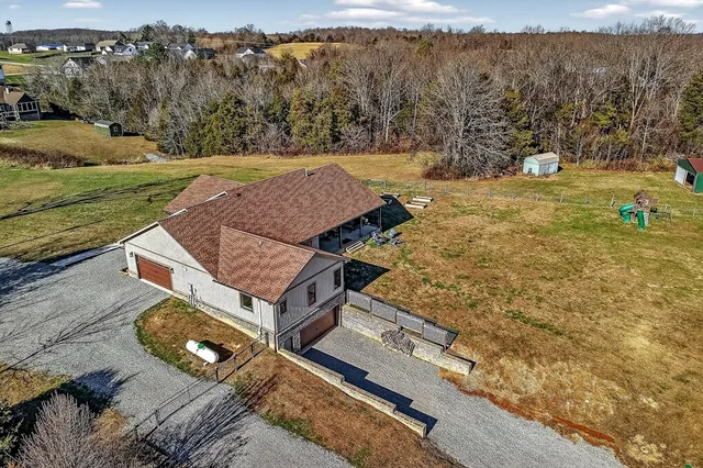 a view of a yard with trees