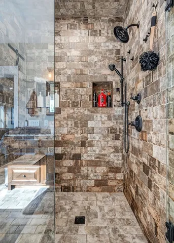a living room with furniture flat screen tv and wooden floor