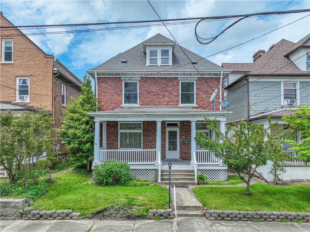 114 Union Street Uniontown, PA 15401 - Photo 1 of 28 a front view of a house with a yard