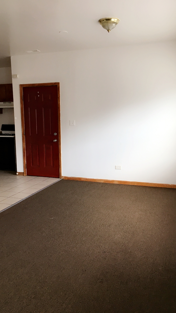 3636 West Cermak Road, Unit 2F Chicago, IL 60623 - Photo 2 of 5 a view of empty room