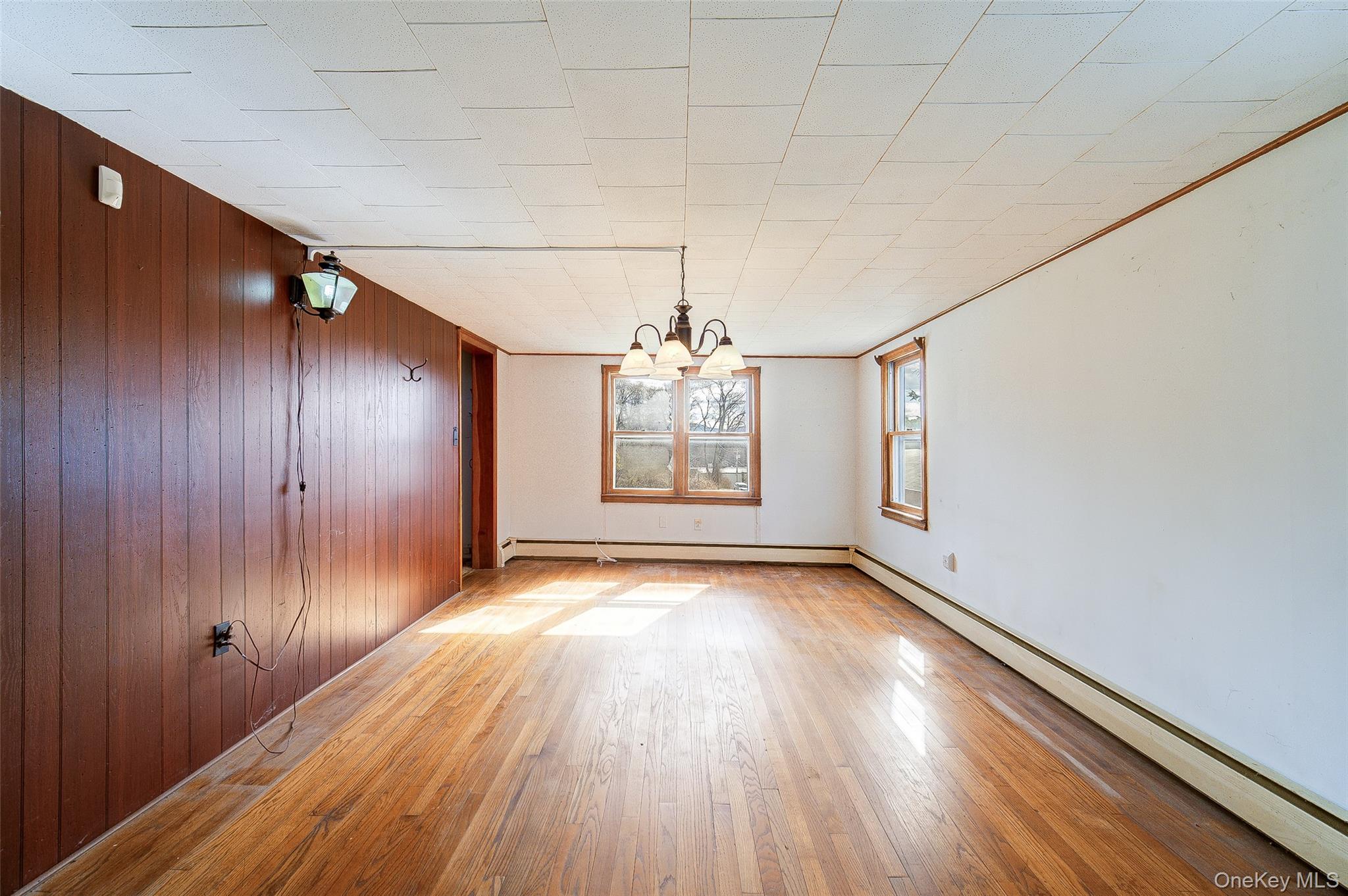 166 Brookside Farms Road Newburgh, NY 12550 - Photo 25 of 45 a view of livingroom with hardwood floor and hallway